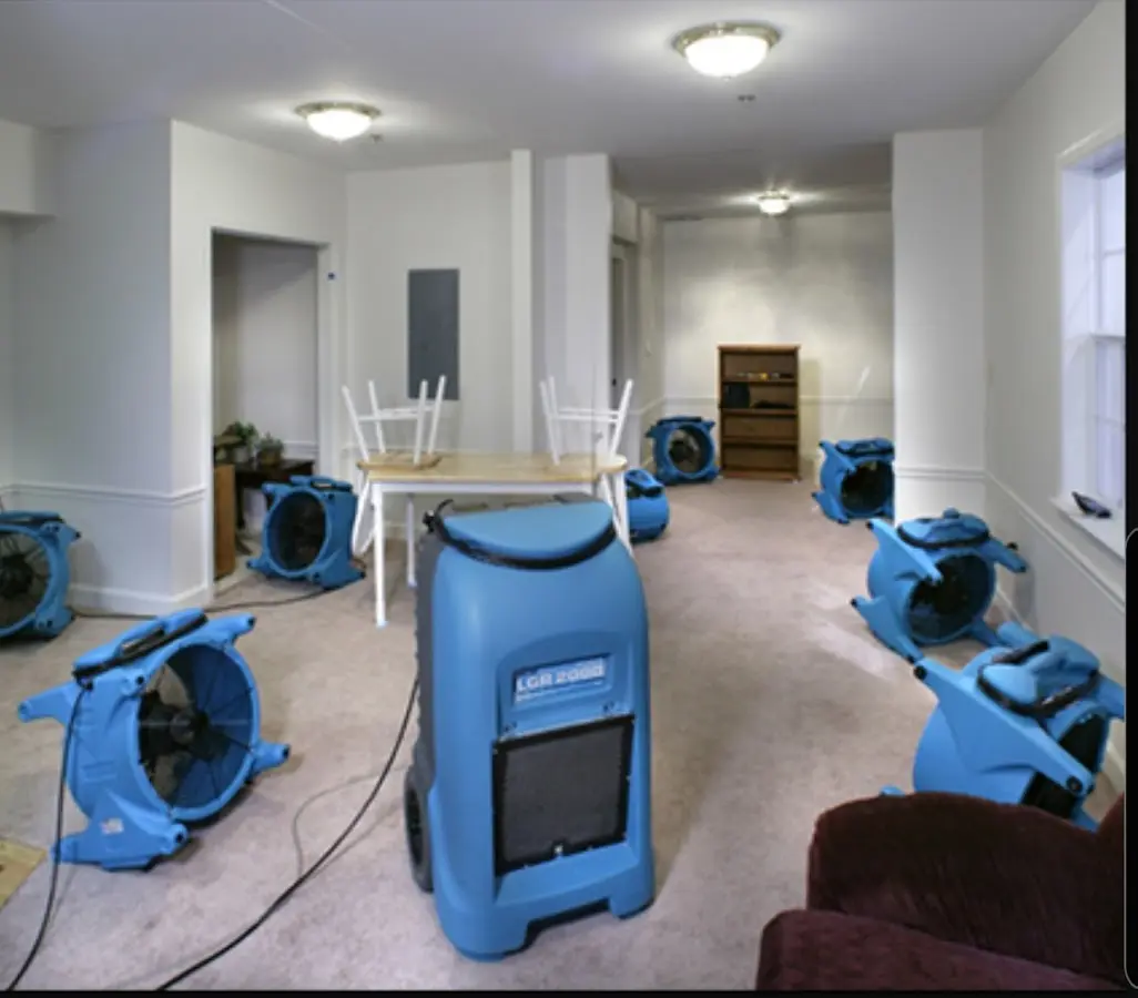 Air movers and dehumidifier setup for Water Extraction & Removal in Carrollton